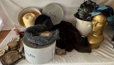 A quantity of vintage costume to include a fur stole, leather and evening gloves, hats, hat boxes,