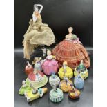 A quantity of half dolls, one made into a lamp, others with lidded pots, one marked France, one