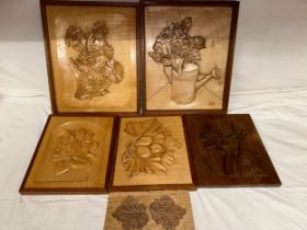 Five hand carved oak and sycamore wall plaques all with a fauna and foliage theme and a small