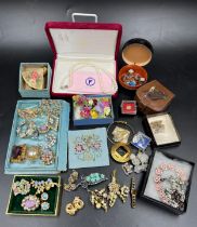A quantity of costume jewellery to include cultured pearls, brooches etc.