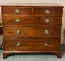 A 19thC mahogany chest of two short over three long drawers on bracket feet and brass handles. 102cm