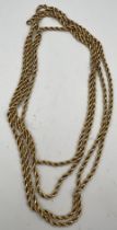 A 9 carat gold rope twist chain necklace. Length 144cm, weight 29.7gm.