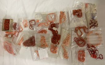 A quantity of coral to include loose beads and necklaces, some in need of re threading.