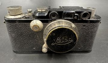 A Leica III 35mm rangefinder camera, black, 1935. With a 50mm 1:3.5 Leitz Elmar lens. Camera body