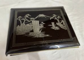 An Oriental Lacquer Postcard Album containing Japanese and Chinese postcards of topographical