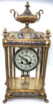 French champlevé bronze and enamel mantel clock with enamel face, double barrel mercury pendulum and