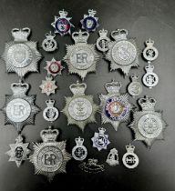 An assortment of Police helmet, cap badges and buttons. Large Police badges to include Hull City,