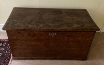 A 19thC elm chest with candle box, handles, hinges and escutcheon all original. 108cm l x 53cm w x