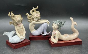Lladro Mermaid set, to include Illusion 1413, Fantasy 1414 and Mirage 1415, all with wooden