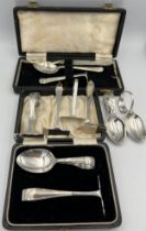 Two boxed baby spoons and pushers, Birmingham 1935 and Sheffield 1947 together with 2 baby spoons