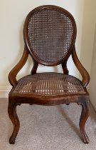 A 19thC mahogany chair with cane back and seat. 82cm h to back.