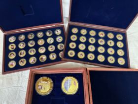 Two boxed sets of gold plated commemorative coins, 24 in each box, Princess Diana and Queen