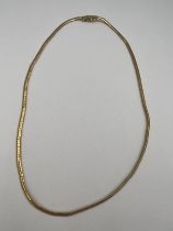 A 18 carat yellow gold smooth link necklace. Length 42cm. Weight 16.8gm.