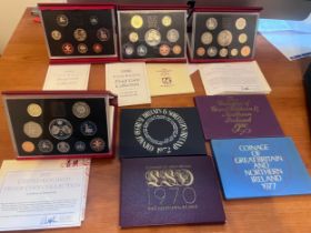 Four cased sets of United Kingdom proof coins, limited editions issued by Royal Mint with