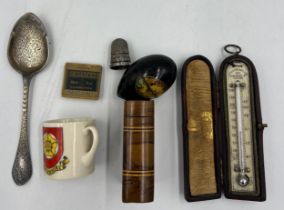 A miscellaneous lot to include a miniature leather cased thermometer, hallmarked silver preserve