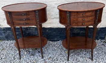 A pair of three drawer oval topped metal mounted cabinets. 70.5cm h x 39cm d x 54cm w.