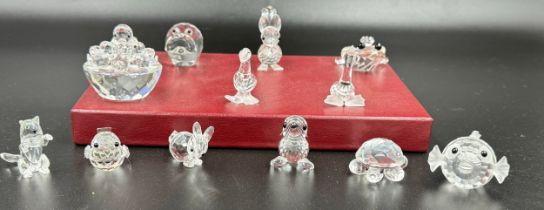 A collection of 12 Swarovski Silver Crystal boxed ornaments to include 7613NR000 002 Duck, 7678NR030