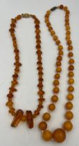 Two strings of amber bead necklaces. Total weight 38.3gm. Approximate lengths 40cm and 50cm.