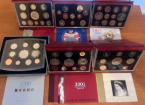 Six cased sets of United Kingdom proof coins, limited editions issued by Royal Mint with