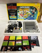 Super Nintendo Super Mario All stars to include 2 controllers, booklets, power cables etc.