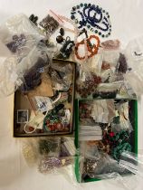 Two boxes of vintage hardstone beads, necklaces etc to include moss agate, amethyst, malachite etc.