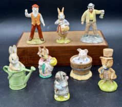 Eight Beswick/Royal Doulton Beatrix Potter figurines to include 'Peter with Postbag', 'Farmer