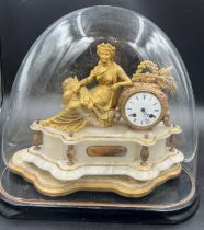 A 19thC French gilt metal and marble clock on wooden base with glass dome. Base 49cm x 22.5cm