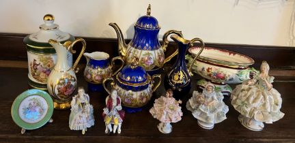 A quantity of mainly continental ceramics to include Limoges and Dresden, menu holder, figurines etc