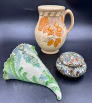 Three ceramic pieces to include an early 19thC creamware cornucopia wall pocket 20cm l, a Jean
