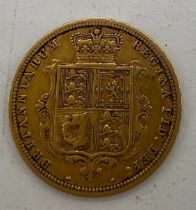A Victorian 1885 half sovereign.