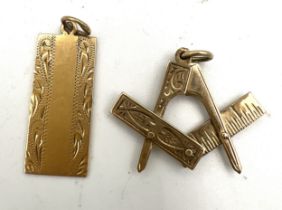 Two 9 carat gold charms to include an opening masonic symbol and an ingot. Total weight 4.3gm.