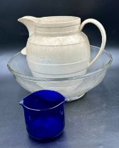 Three early 19thC items to include a blue glass rinser 17cm h, a large glass bowl 39.5cm diameter