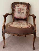 A 19thC walnut open armchair with wool work seat, back and arms. 86cm h to back.