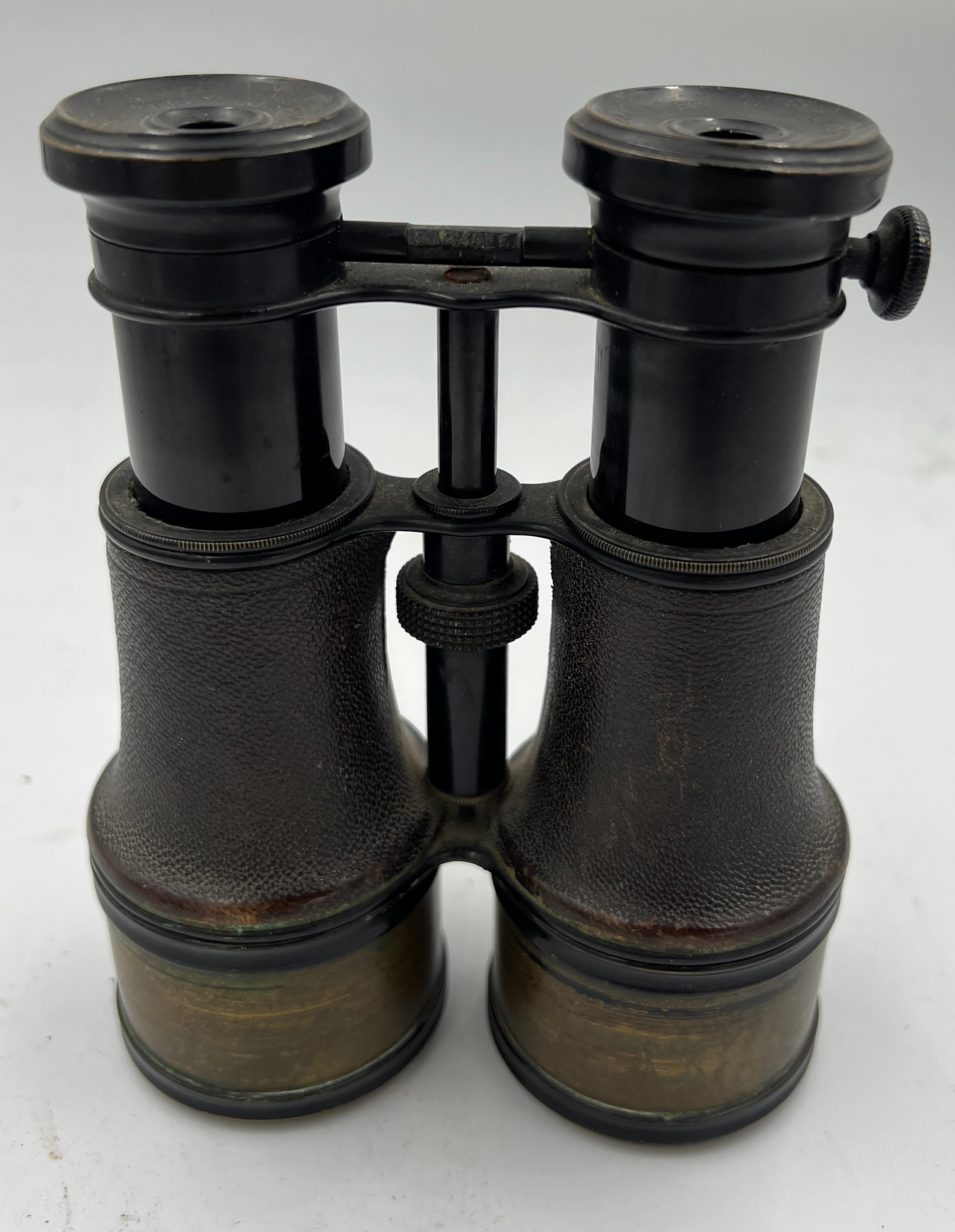 Leather and brass cased binoculars, maker JB Dancer Manchester.