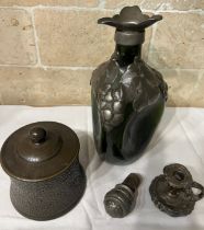 Miscellany to include pewter mounted green glass bottle, small chamber-stick and a lidded ceramic
