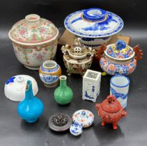 Various oriental ceramics to include large lidded bowls, lidded incense jars, blue, white and