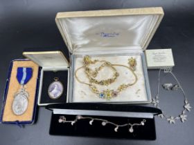 A quantity of vintage costume jewellery to include Coro necklace, bracelet and earrings, silver