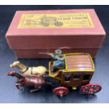 A boxed John Hill and Co Johillco boxed miniature Stage Coach comprising of a brown coach with red