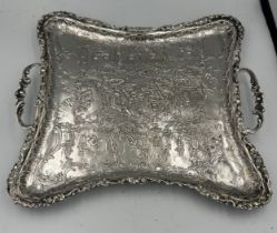 A continental .800 white metal twin handled tray raised on four feet. Weight 350gm.