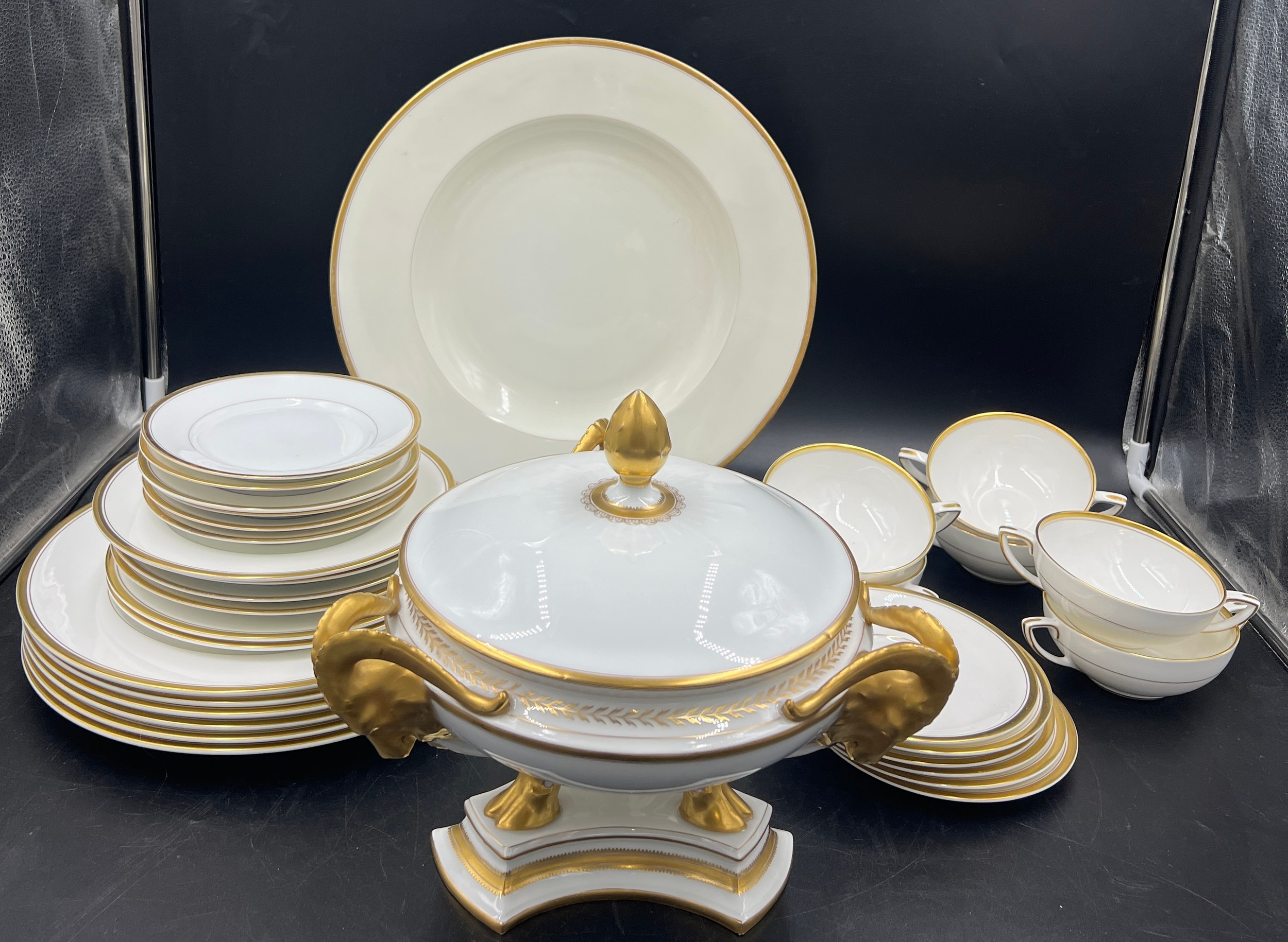 A composite set of white and gilt dinner service to include 6 Royal Worcester Viceroy bowls and