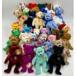 A collection of Beanie Babies all with original labels to include Jack, Clover, Teddy, England x2,