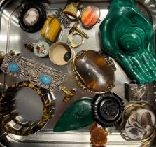 A quantity of 19thC and 20thC costume jewelllery etc to include jet brooches, tigers eye bangle,