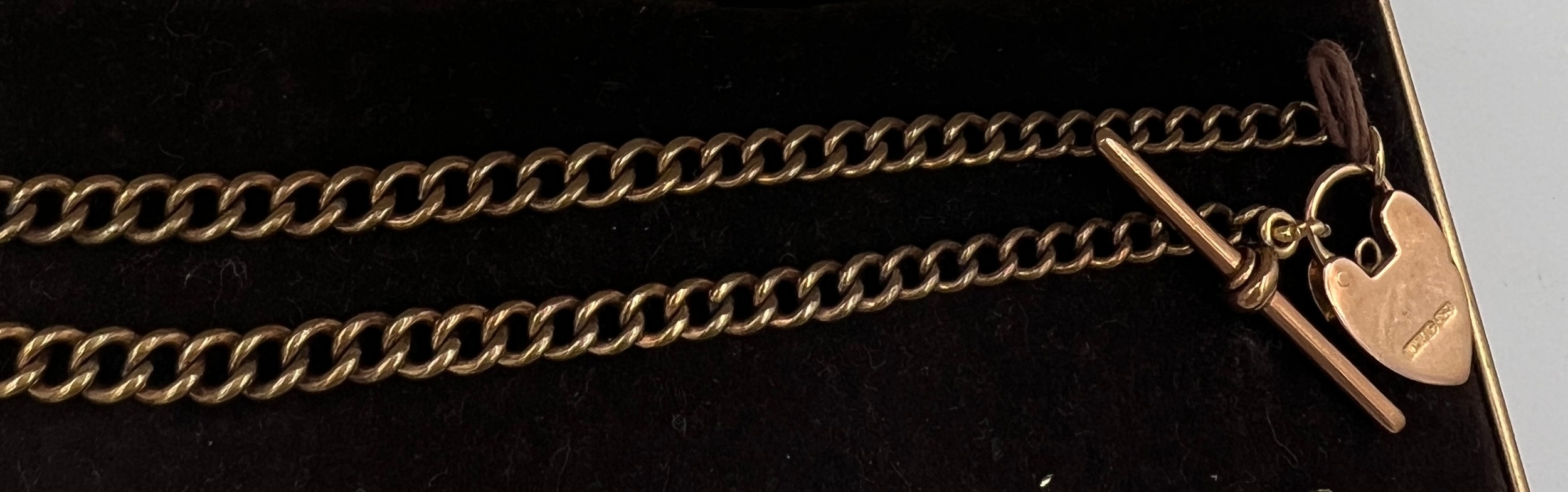 A nine carat gold clasp and T bar with unmarked yellow metal chain. Total weight 16.1gm. - Image 2 of 3