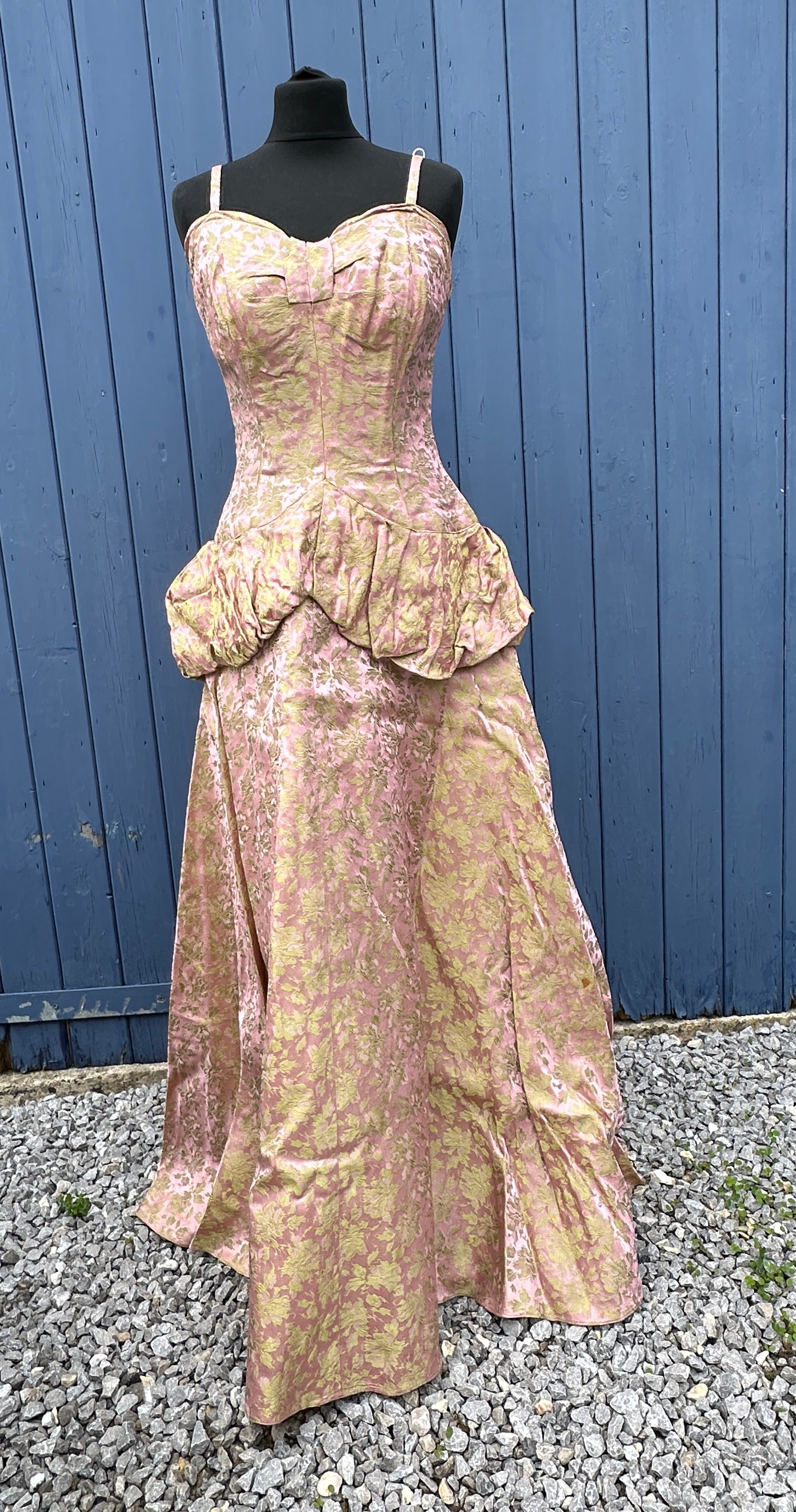 A 1950's Chafil, London full length pink and green demask dress, sleeveless with boned bodice, lined