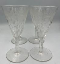 Four 19thC glasses etched with grapes and vine leaves. 12.5cm h.