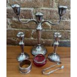 Silver to include candelabra and two candlesticks with weighted bases, Birmingham 1978/79. Maker