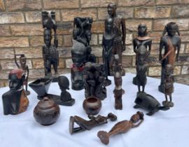 Tribal dark wooden African figures, ornaments and bowls. Tallest 42cm h. (20)