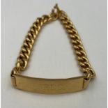 An 18 carat gold identity bracelet. Weight 18.36gm.