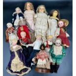 A collection of various 19thC/20thC dolls to include 4 wax dolls, 7 with bisque heads to include a
