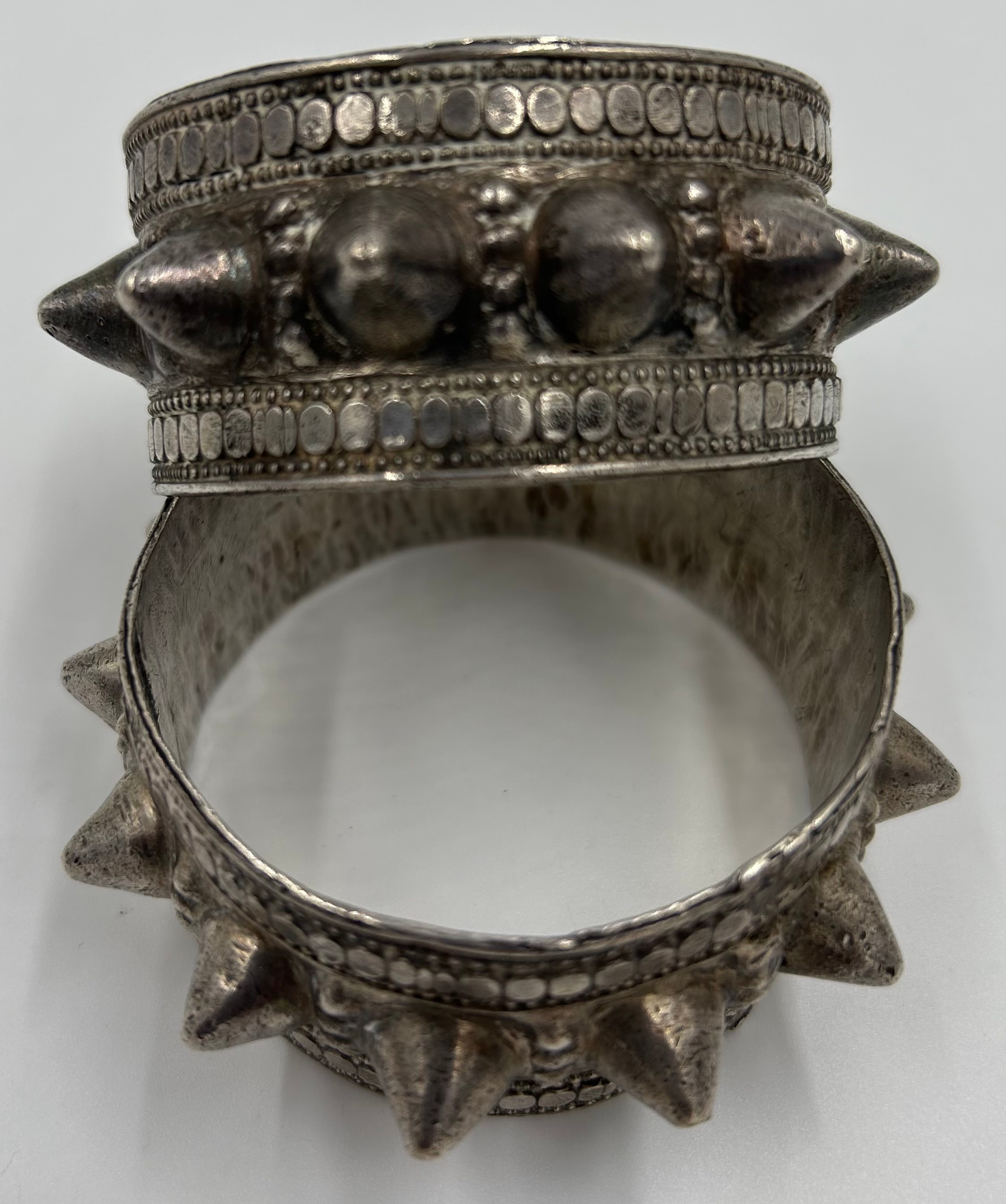 A pair of white metal Omani fertility bracelets. 147gm. 6.2cm approx. - Image 3 of 3